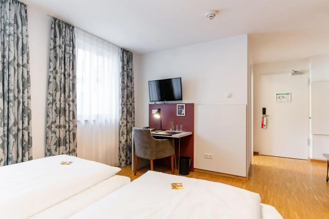 Отель Altstadthotel Grauer Wolf Эрланген