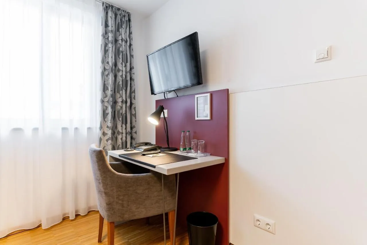 Отель Altstadthotel Grauer Wolf Эрланген